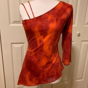 Asymmetrical one sleeved blouse